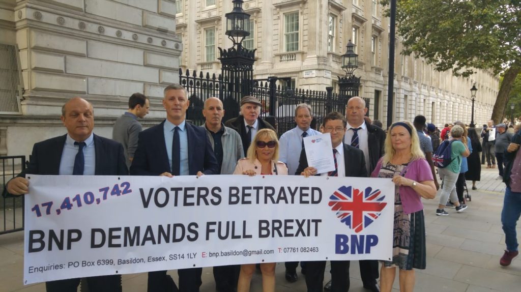 BNP activists paid a visit to Downing Street with a BNP Demands Full Brexit banner